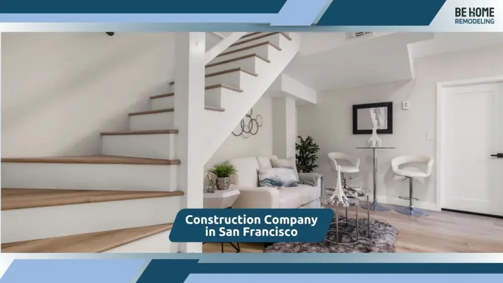 Bright renovated living space with wood stairs and seating by Be Home Remodeling